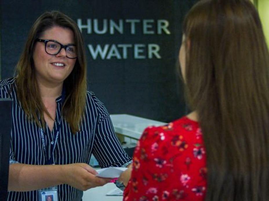 Hunter Water worker and customer