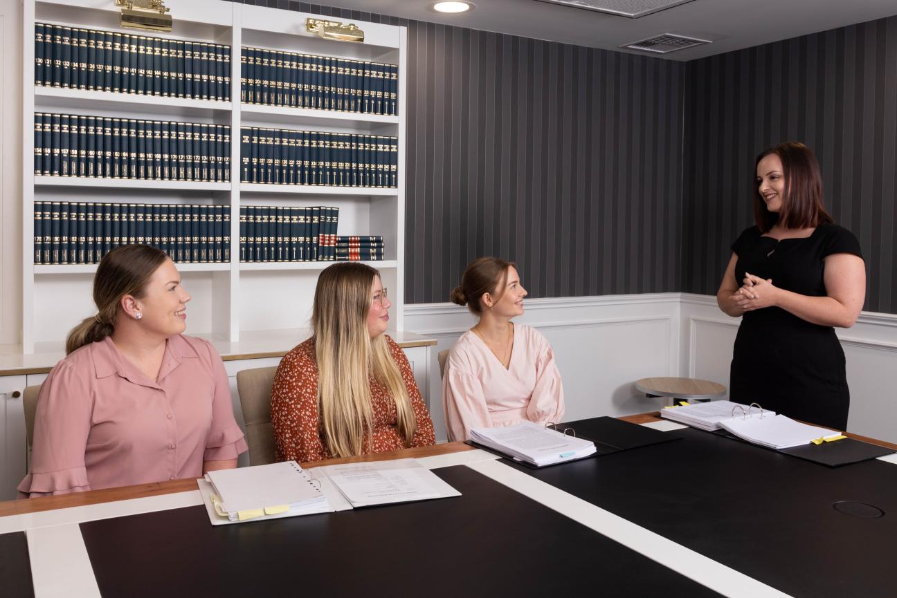 Female lawyers in boardroom